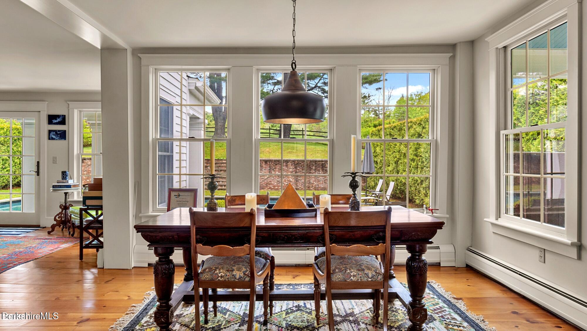 2650 Swamp Road Richmond, MA 01254 - Photo 33 of 49 a view of a dining room with furniture window and outside view