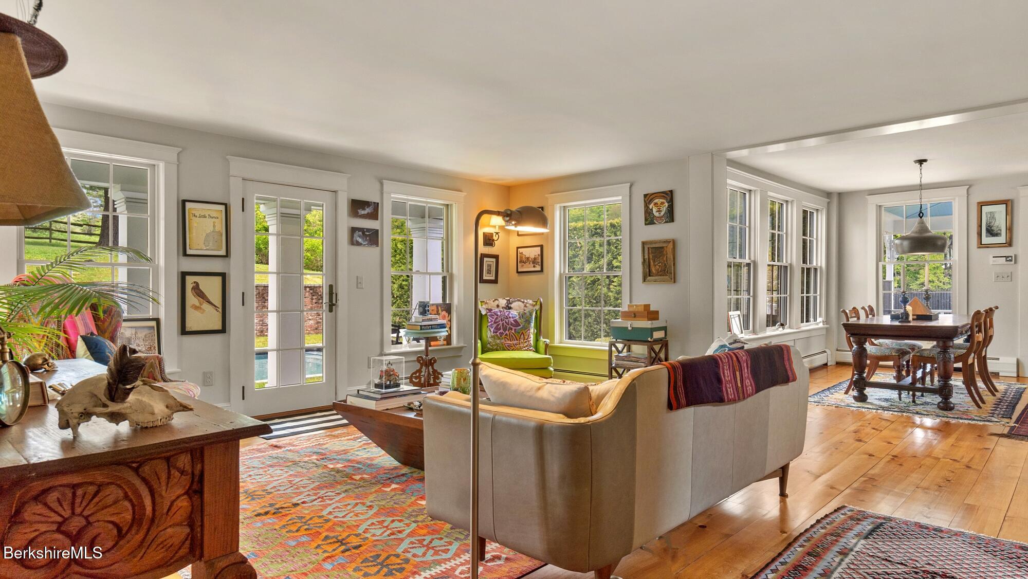 2650 Swamp Road Richmond, MA 01254 - Photo 49 of 49 a living room with furniture and floor to ceiling windows