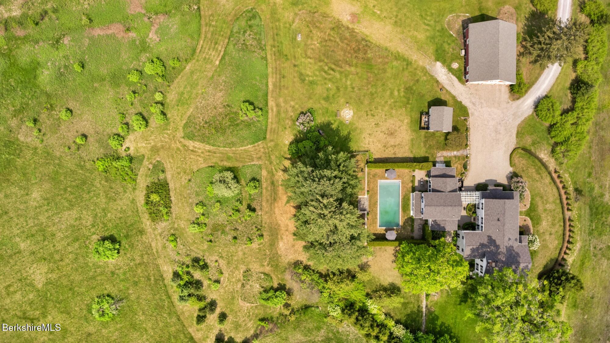 2650 Swamp Road Richmond, MA 01254 - Photo 48 of 49 a yellow building with trees in front of it