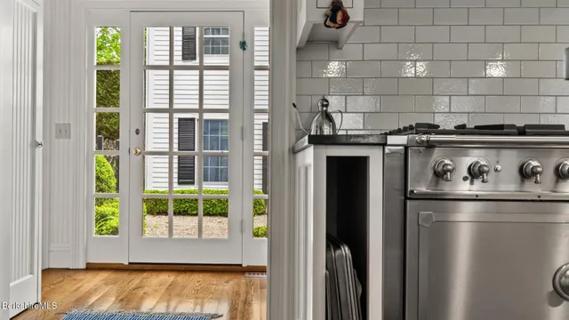 a dining room with furniture and a fireplace