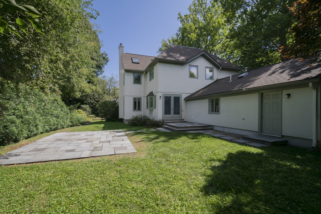 17 Franklin Road Lexington, MA 02420 - Photo 1 of 1 a view of a backyard with a garden