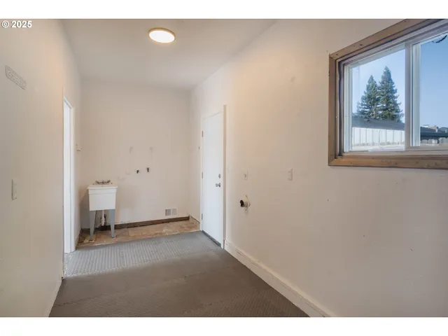 a view of a room with an empty space