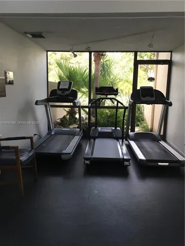 a view of a room with gym equipment