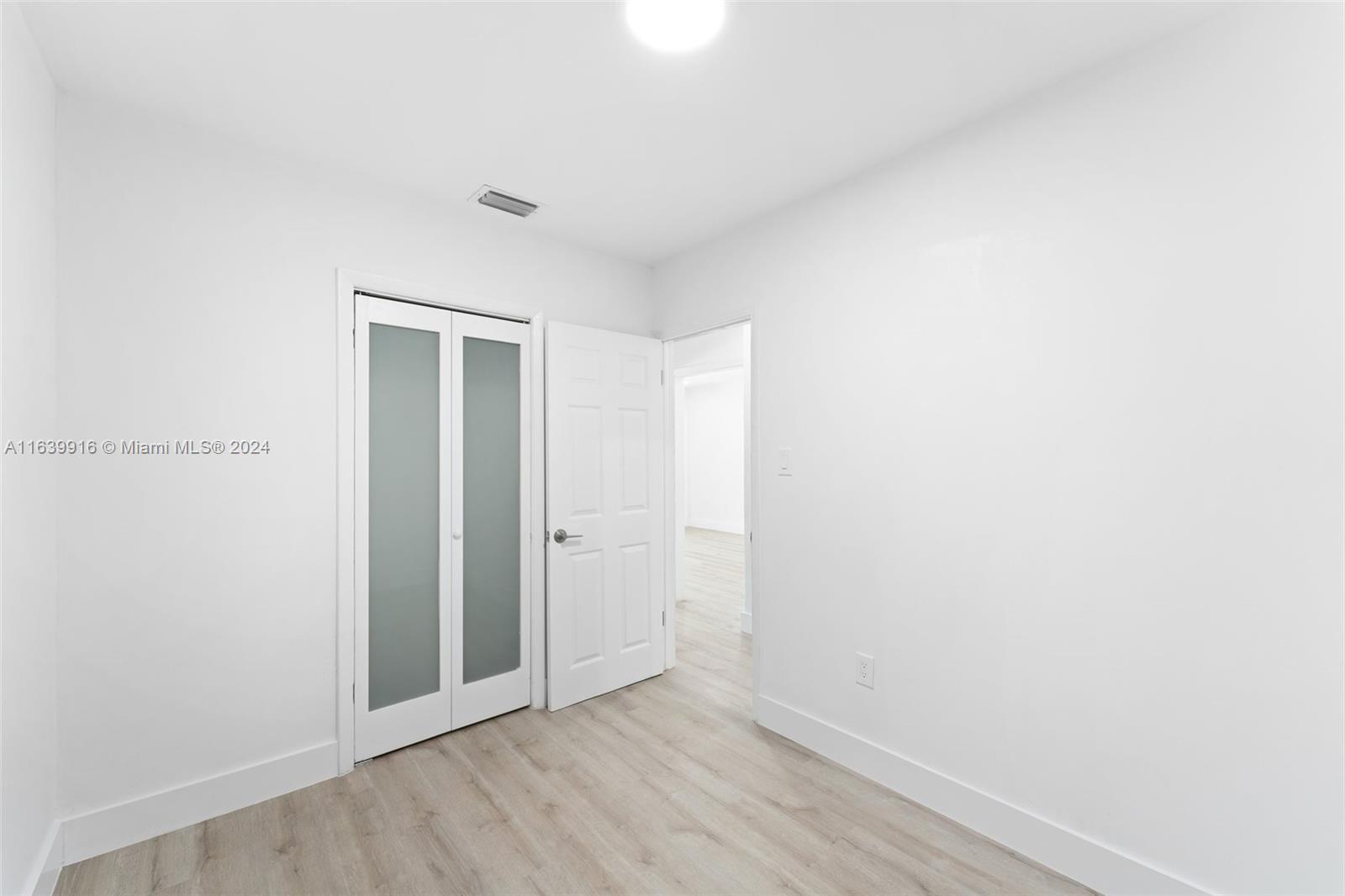 3155 Southwest 27th Lane, Unit 1 Miami, FL 33133 - Photo 12 of 18 a view of an empty room
