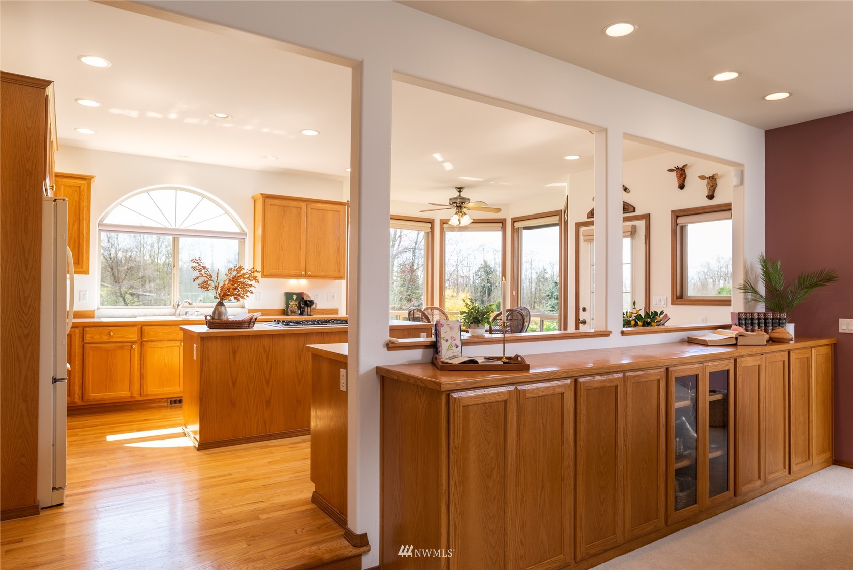 6187 Swanson Road Bow, WA 98232 - Photo 12 of 40 a room with kitchen island granite countertop a large window and a view of living room