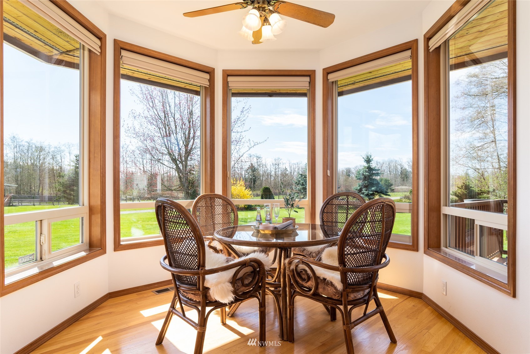 6187 Swanson Road Bow, WA 98232 - Photo 14 of 40 a view of a city from a dining room with furniture and windows