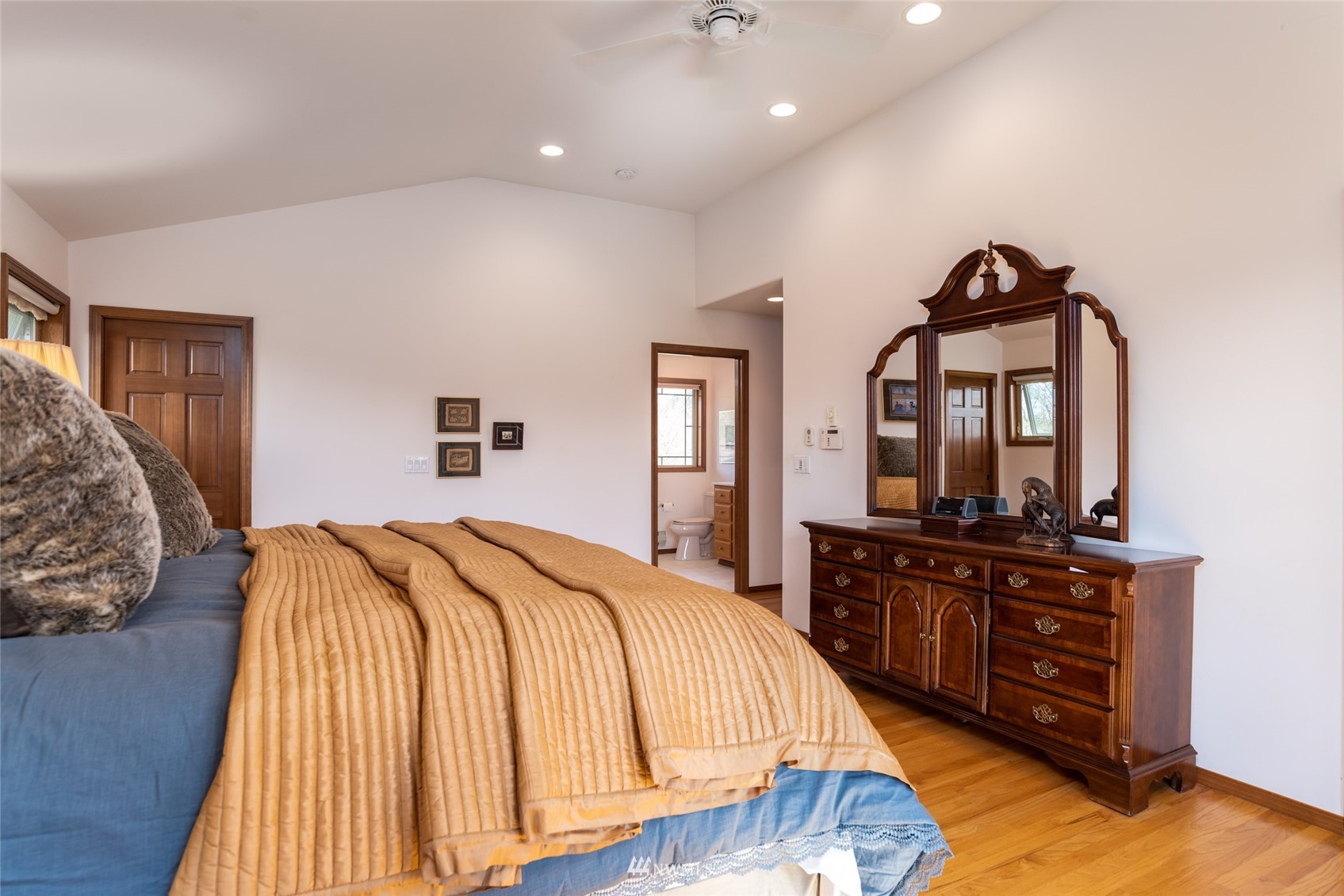 6187 Swanson Road Bow, WA 98232 - Photo 20 of 40 a bed room with a bed and dresser