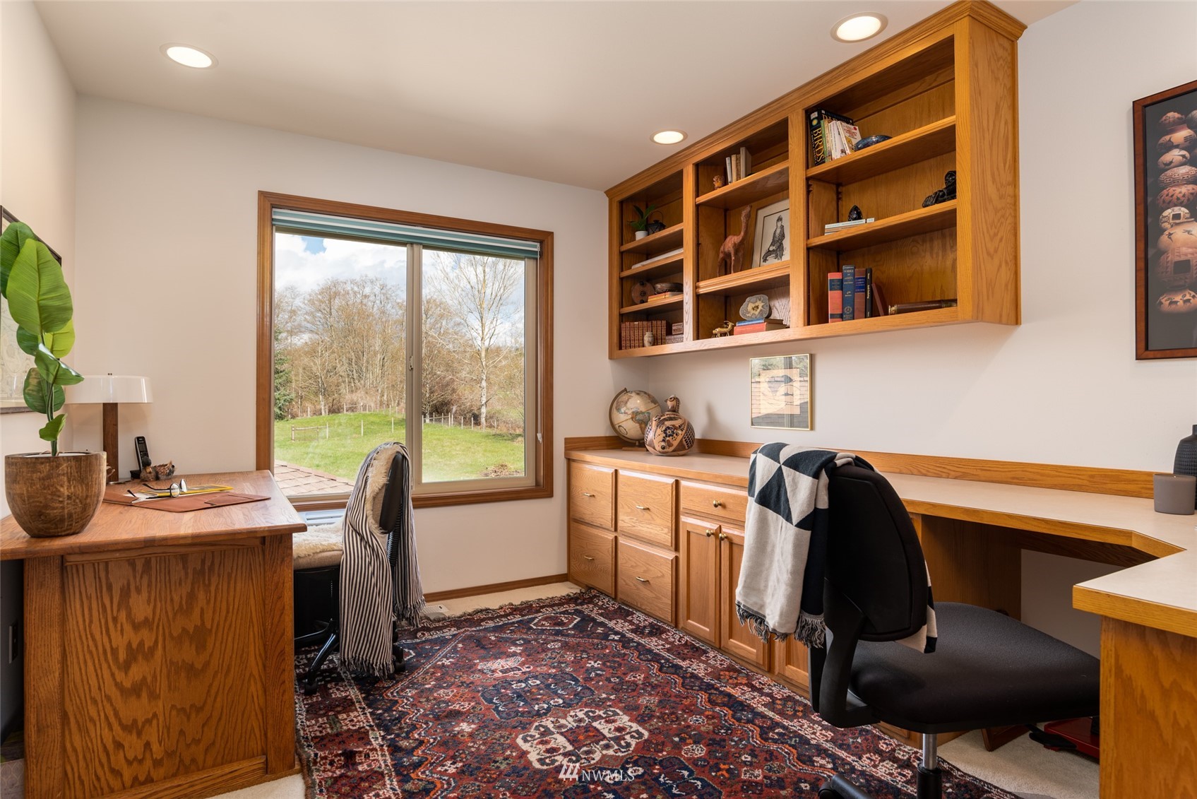 6187 Swanson Road Bow, WA 98232 - Photo 22 of 40 a view of a workspace with furniture and a window