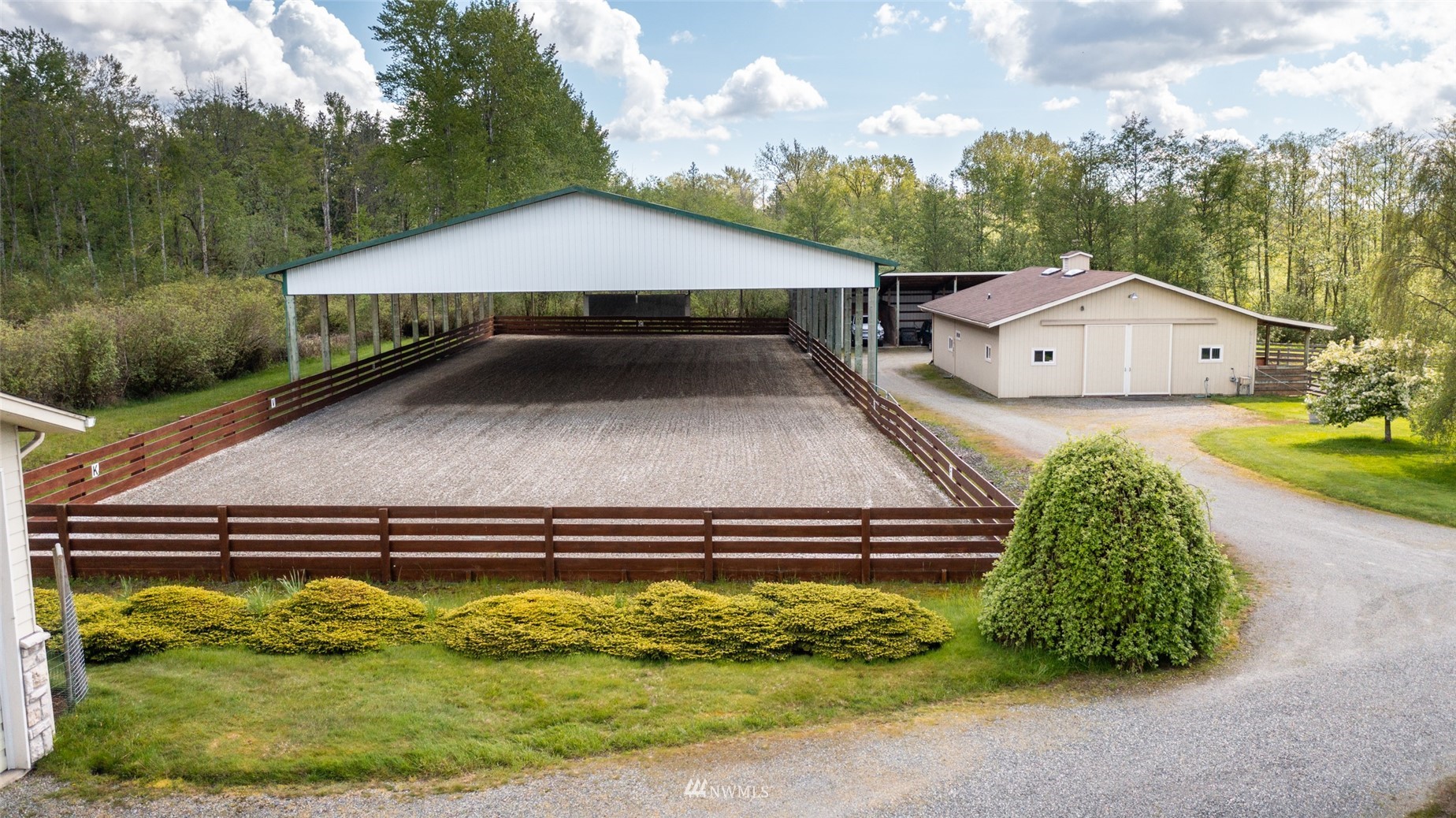 6187 Swanson Road Bow, WA 98232 - Photo 27 of 40 a view of a house with a yard plants and large tree