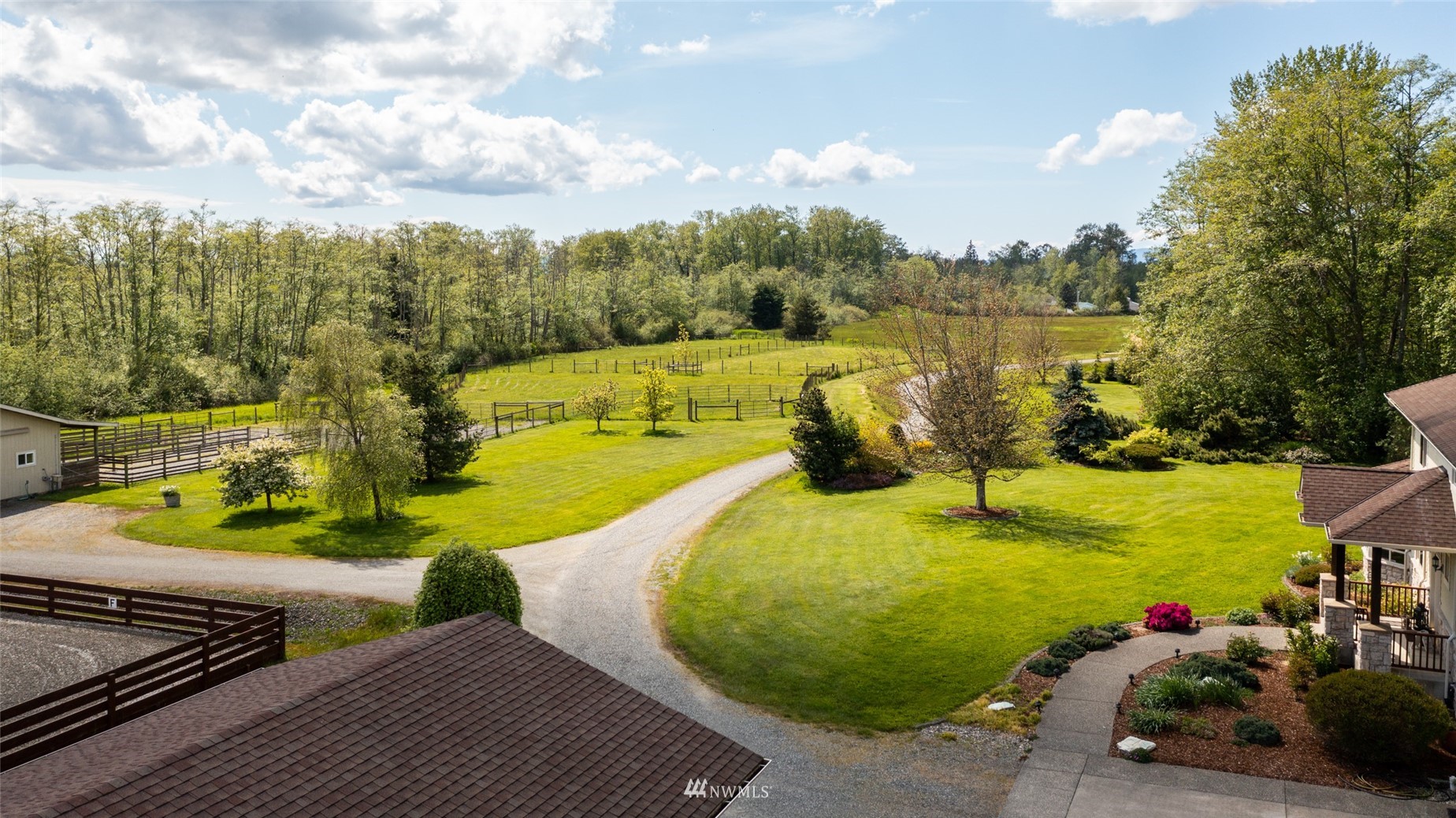 6187 Swanson Road Bow, WA 98232 - Photo 40 of 40 a view of a swimming pool with a patio and a yard
