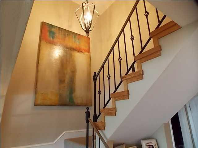 15 Breakers Lane Ridgeland, MS 39157 - Photo 12 of 20 IRON RAILING AND WOOD STEPS ON STAIRWAY