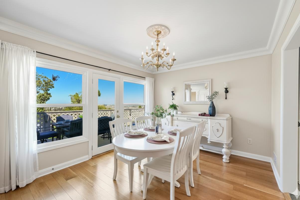 330 41st Avenue San Mateo, CA 94403 - Photo 2 of 38 a view of a dining room with furniture window and wooden floor