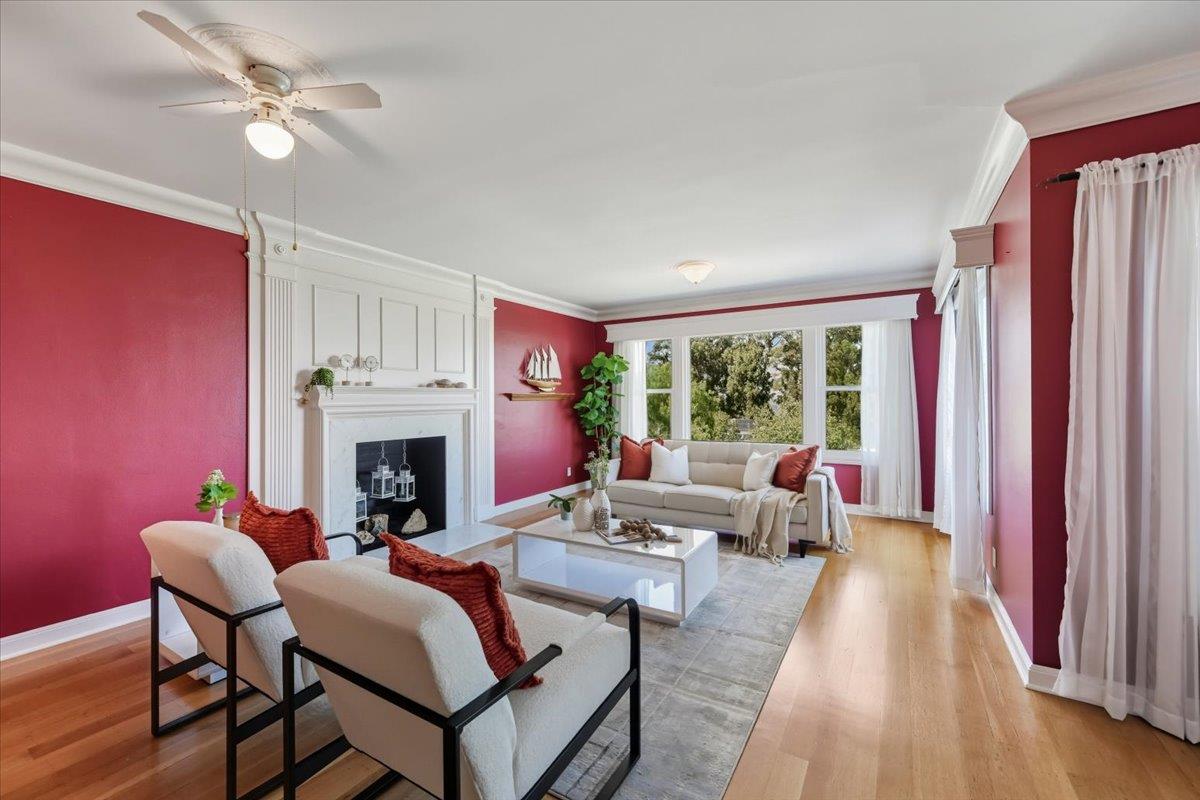 330 41st Avenue San Mateo, CA 94403 - Photo 7 of 38 a living room with furniture fireplace and a large window