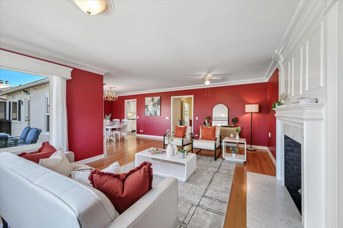 330 41st Avenue San Mateo, CA 94403 - Photo 9 of 38 a living room with furniture and a fireplace