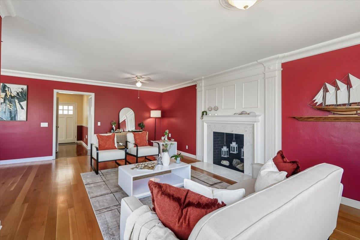 330 41st Avenue San Mateo, CA 94403 - Photo 10 of 38 a living room with furniture and a fireplace