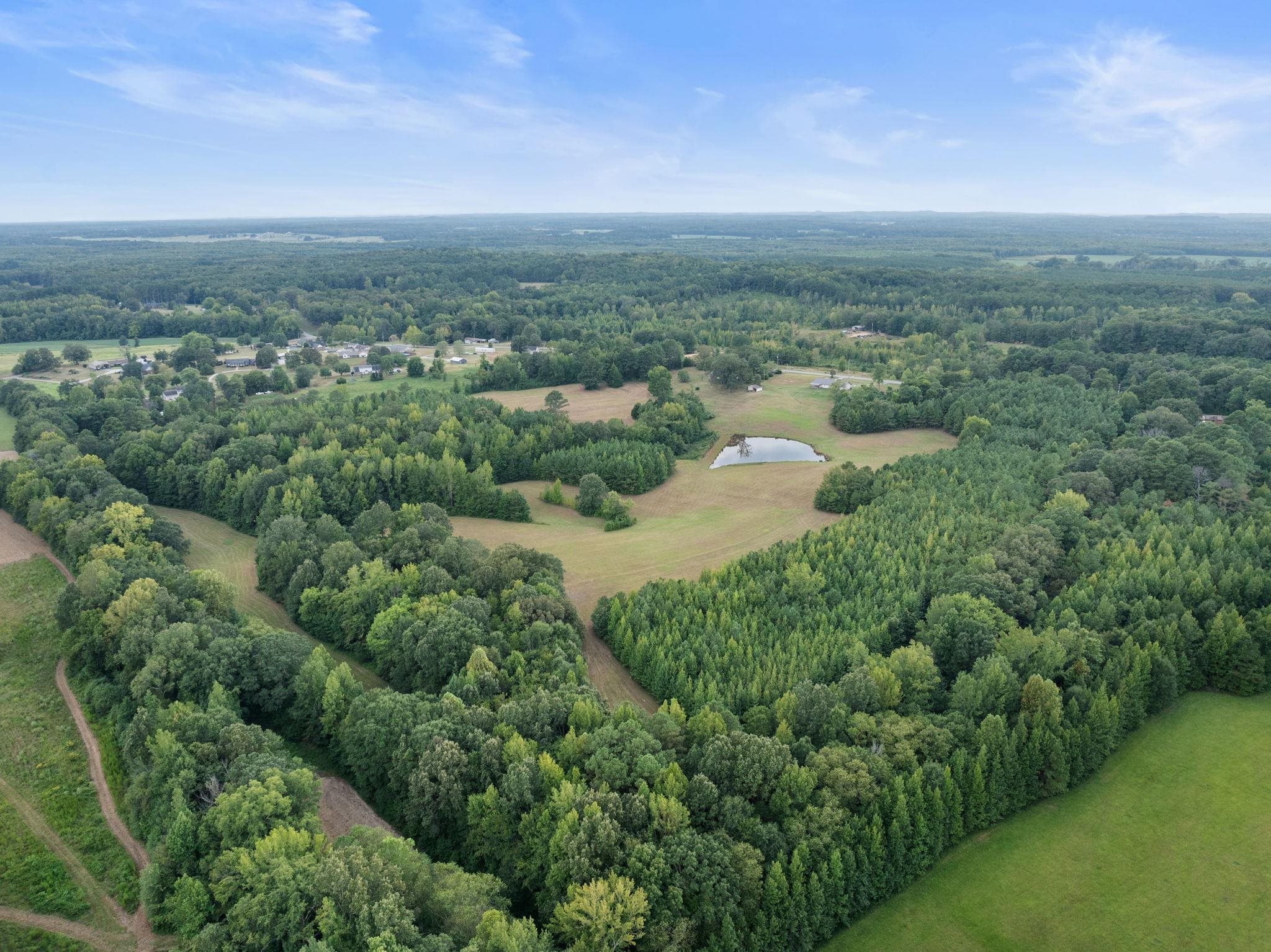 116 County Road 713 Corinth, MS 38834 - Photo 13 of 40 a view of a lake with green space