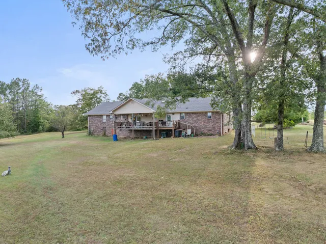 a house with trees in front of it