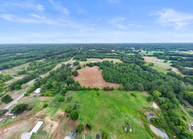 a view of a balcony with an outdoor space