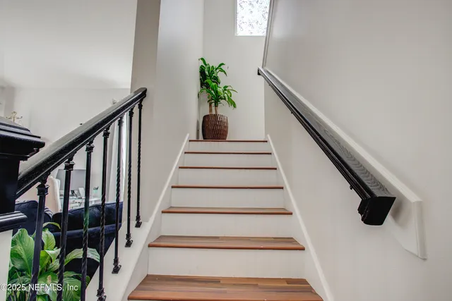 a workspace with furniture and wooden floor