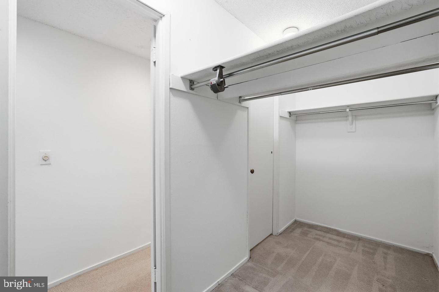 6101 Edsall Road, Unit 502 Alexandria, VA 22304 - Photo 15 of 34 Deep double-access walk-in closet for his and hers