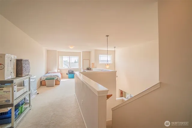 a view of living room with furniture and a flat screen tv