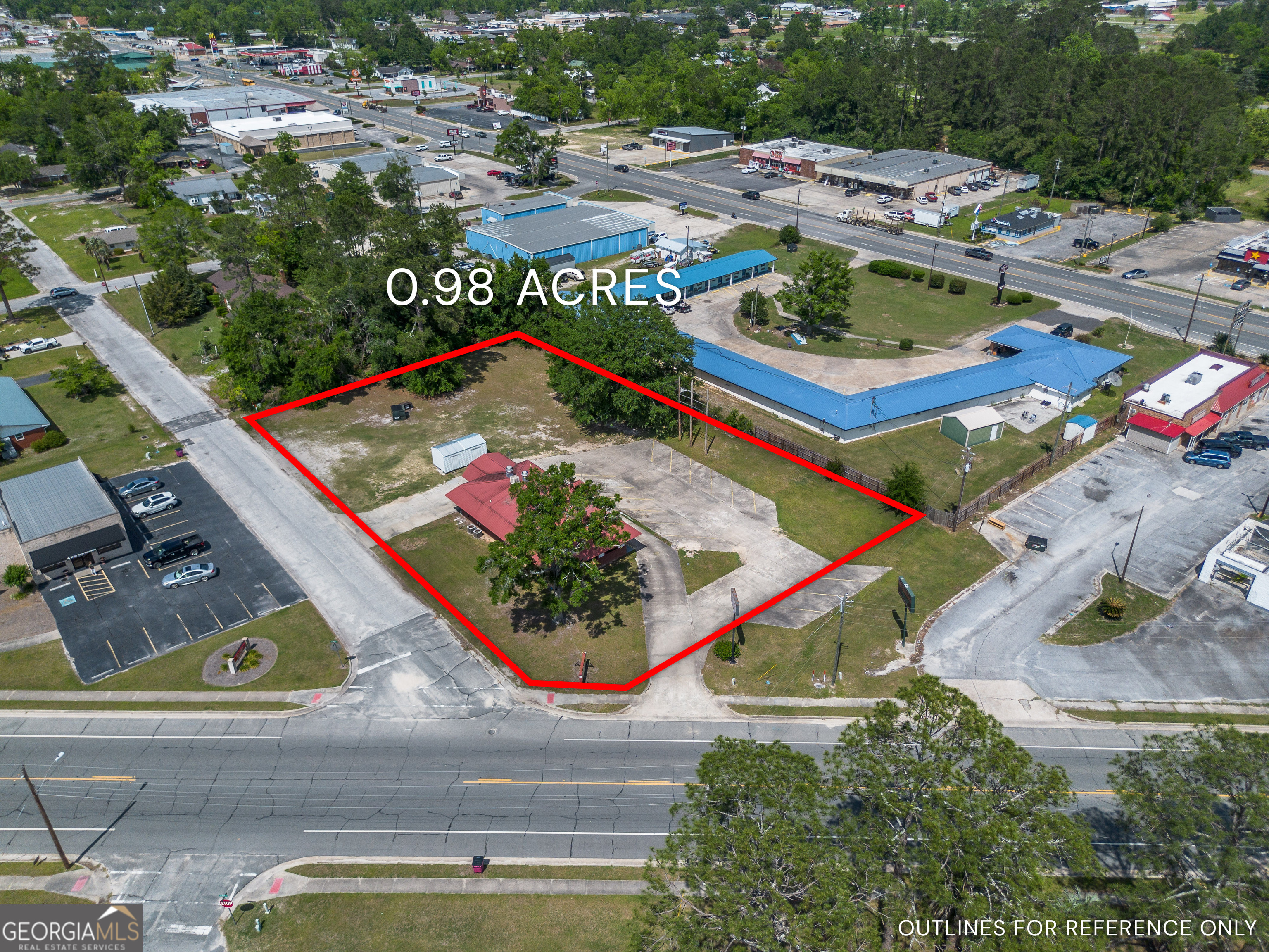 804 South Dixon Street Alma, GA 31510 - Photo 1 of 33 an aerial view of an outdoor space