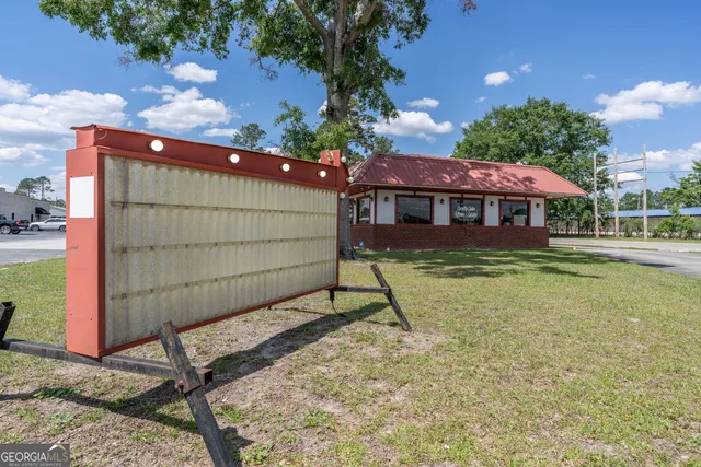 a house view with a garden space