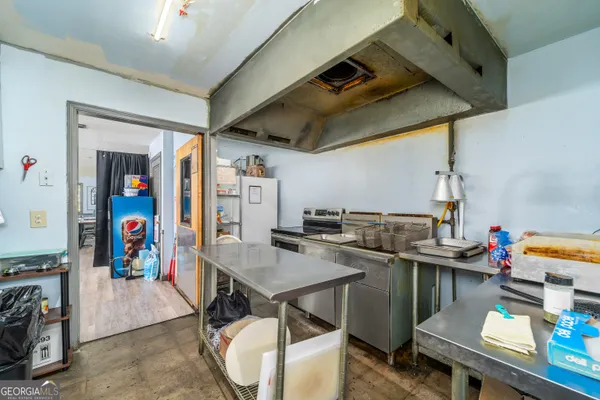 a view of a workspace with furniture