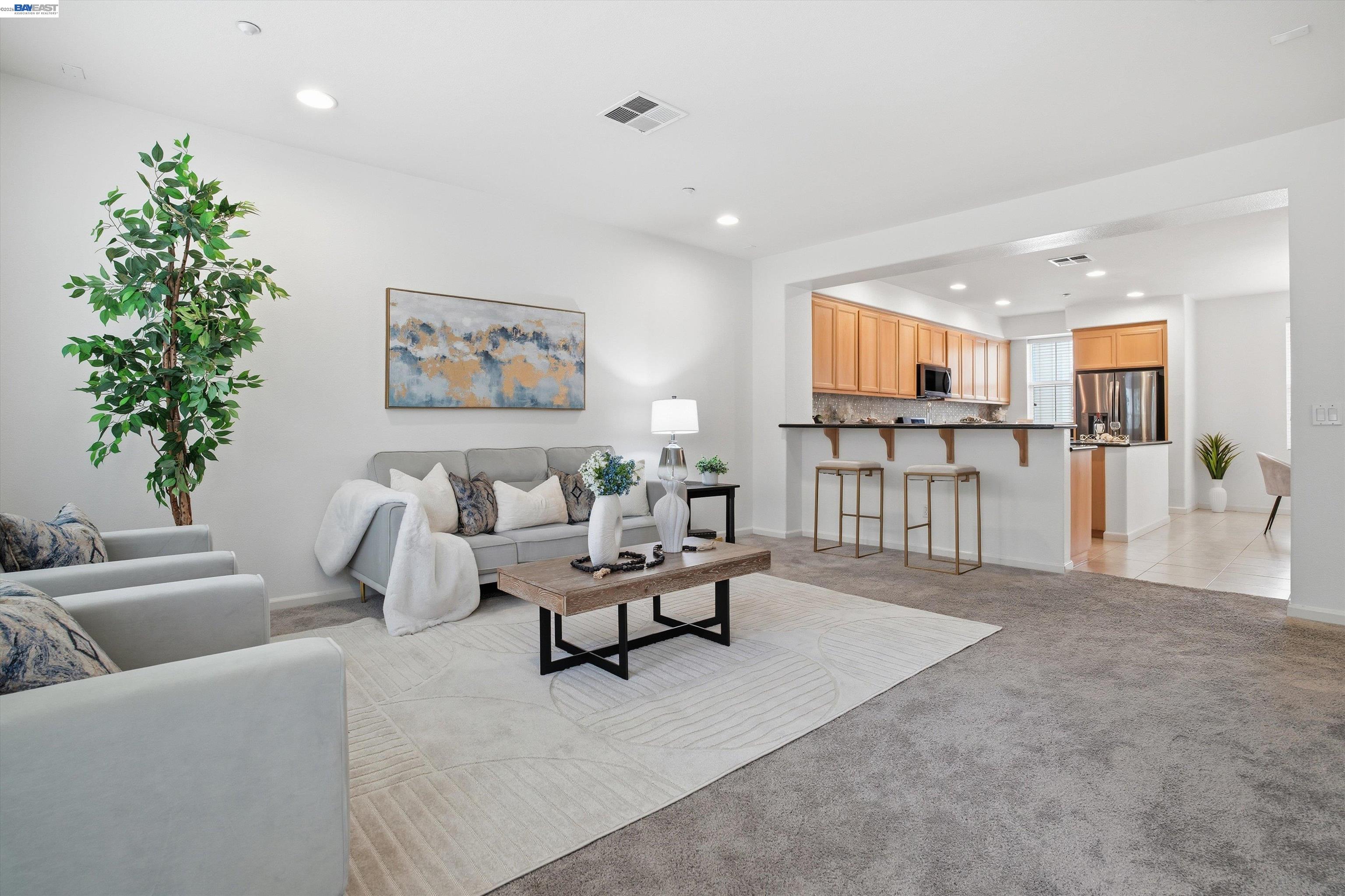2833 Alnwick Avenue, Unit 7 Livermore, CA 94551 - Photo 13 of 37 a living room with furniture and kitchen view