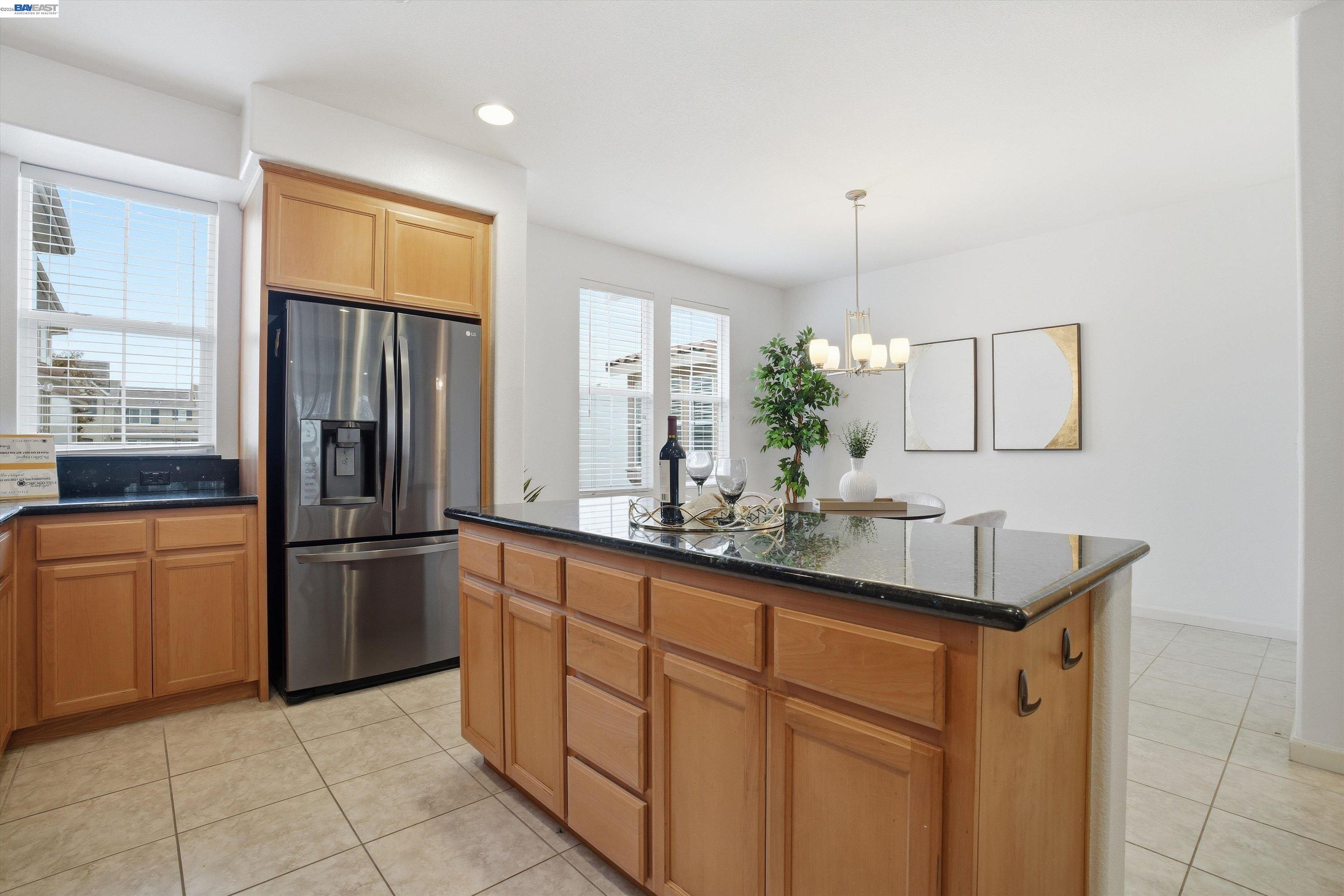 2833 Alnwick Avenue, Unit 7 Livermore, CA 94551 - Photo 22 of 37 a kitchen with stainless steel appliances granite countertop a refrigerator and a sink