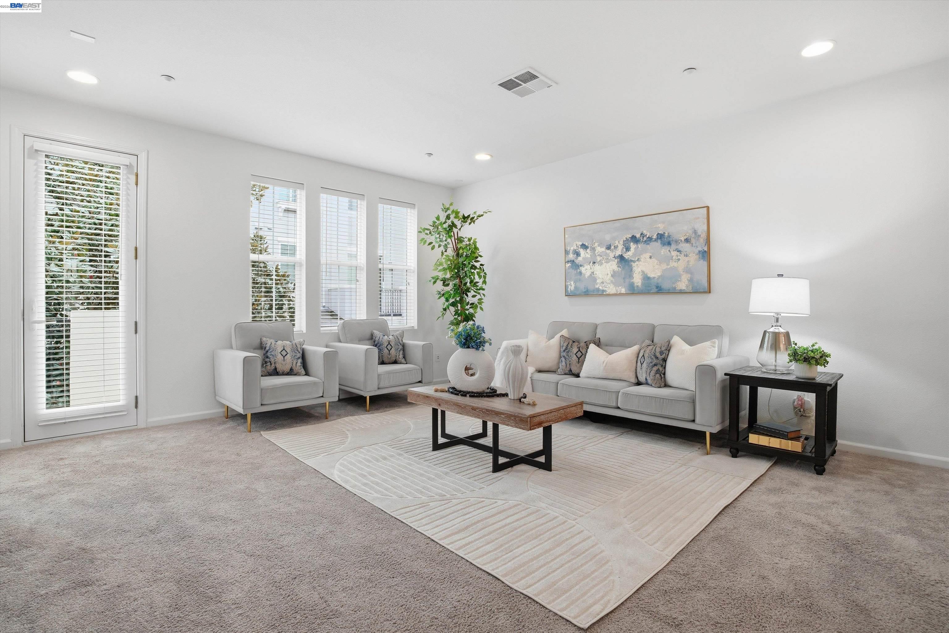 2833 Alnwick Avenue, Unit 7 Livermore, CA 94551 - Photo 9 of 37 a living room with furniture and a large window