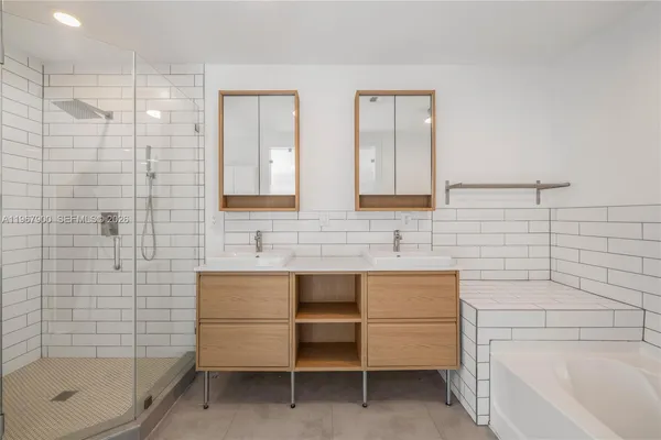 a bathroom with a sink and a bathtub