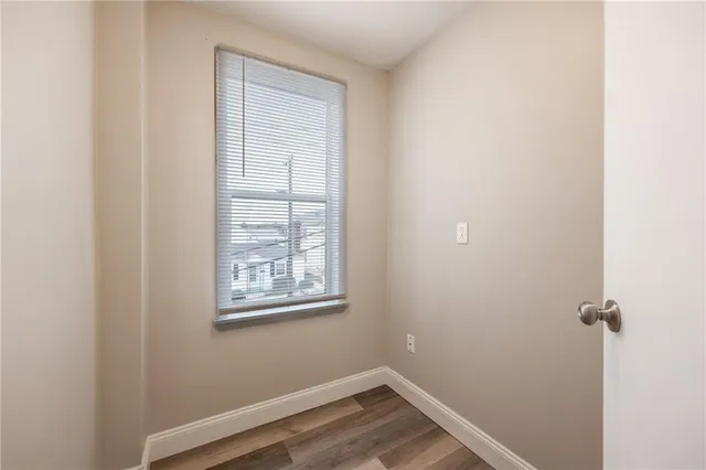 a view of a room that has a window in it