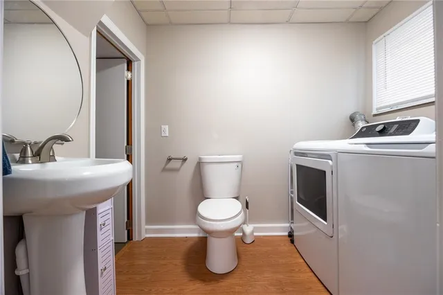 a bathroom with a sink and toilet