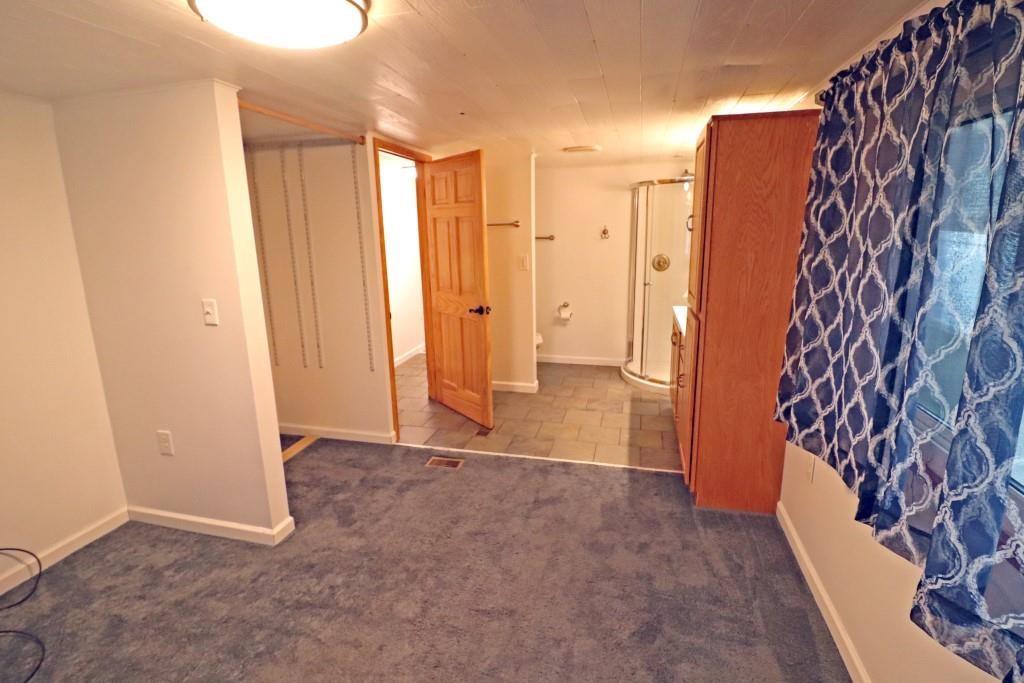 253 Wardentown Road Alverton, PA 15612 - Photo 12 of 18 a view of an empty room and a window