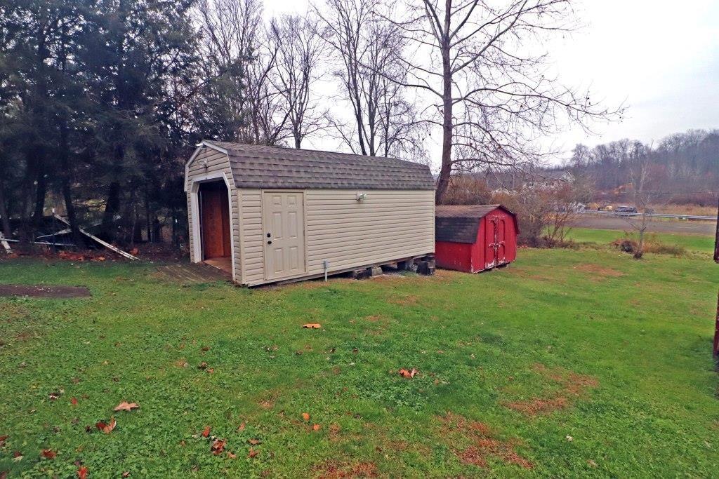 253 Wardentown Road Alverton, PA 15612 - Photo 17 of 18 a view of backyard with barn and green space