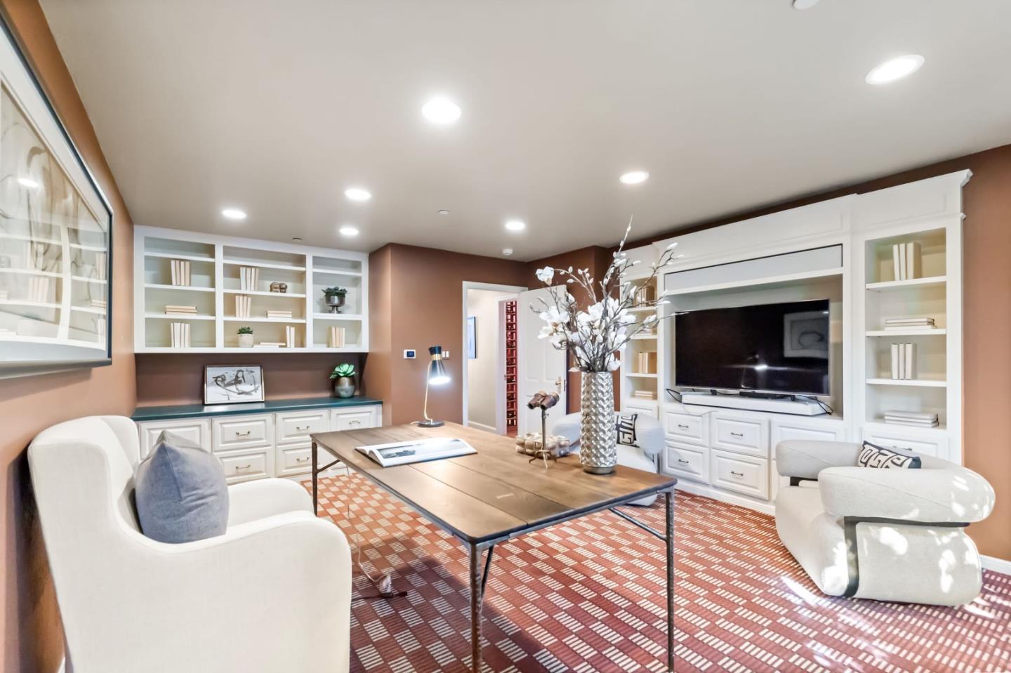 1600 Marlborough Road Hillsborough, CA 94010 - Photo 44 of 111 a living room with furniture and a flat screen tv