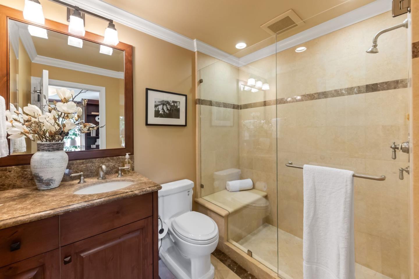 1600 Marlborough Road Hillsborough, CA 94010 - Photo 54 of 111 a bathroom with a granite countertop sink toilet and shower