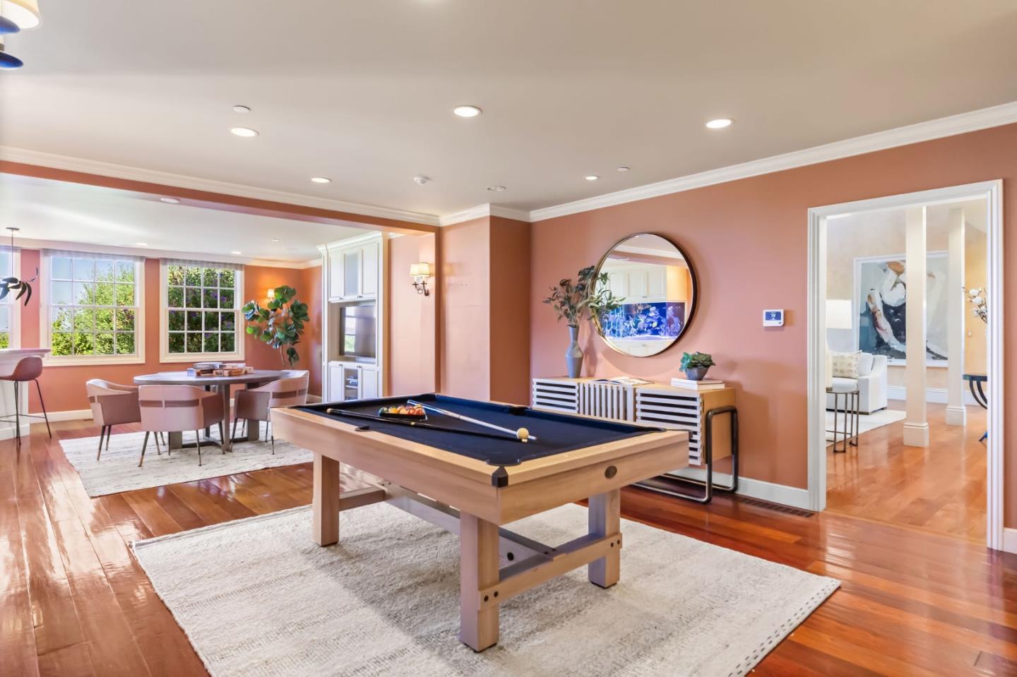 1600 Marlborough Road Hillsborough, CA 94010 - Photo 74 of 111 a living room with furniture a rug and a large window
