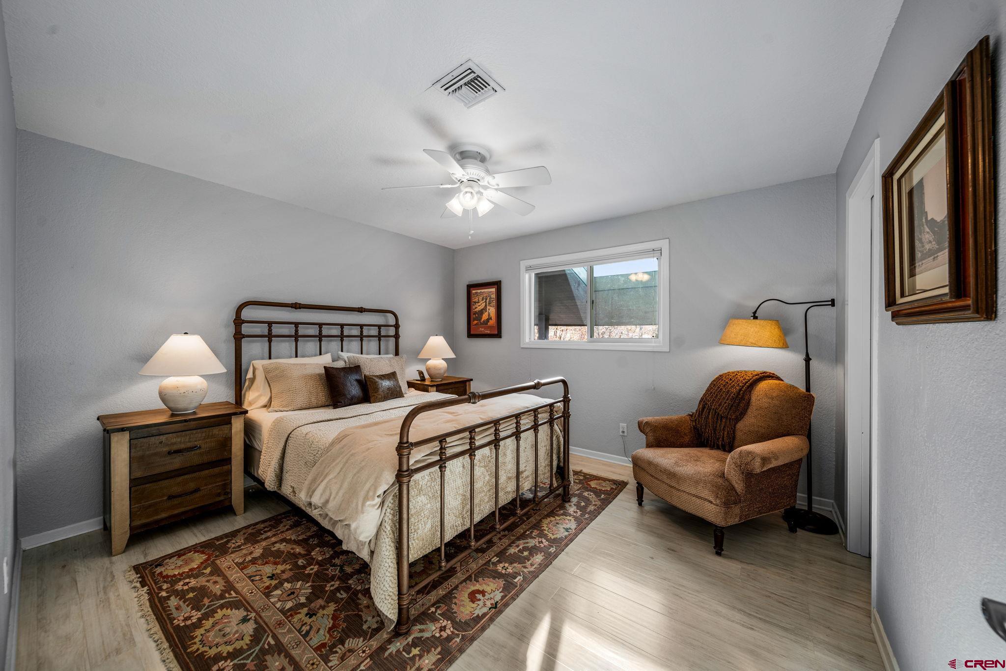 25 Highland Place Durango, CO 81301 - Photo 29 of 40 a bedroom with bed and window