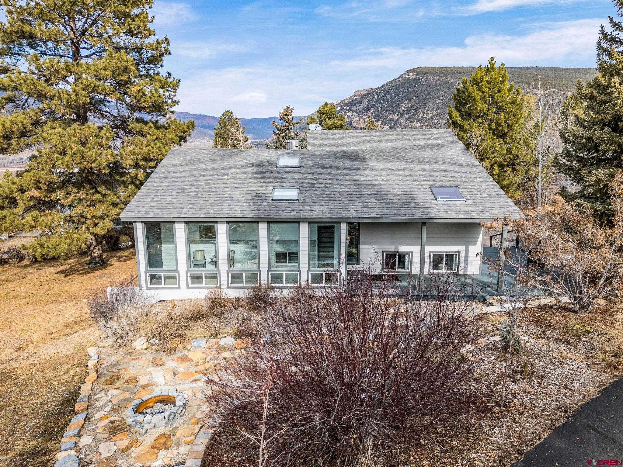 25 Highland Place Durango, CO 81301 - Photo 35 of 40 front view of a house with a yard