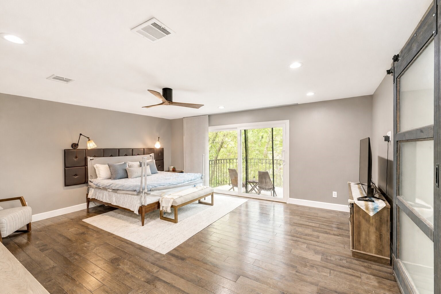 201 Vanderpool Lane, Unit 130 Houston, TX 77024 - Photo 22 of 41 The spacious 18'x17' primary bedroom includes access to another balcony which provides a serene private retreat.