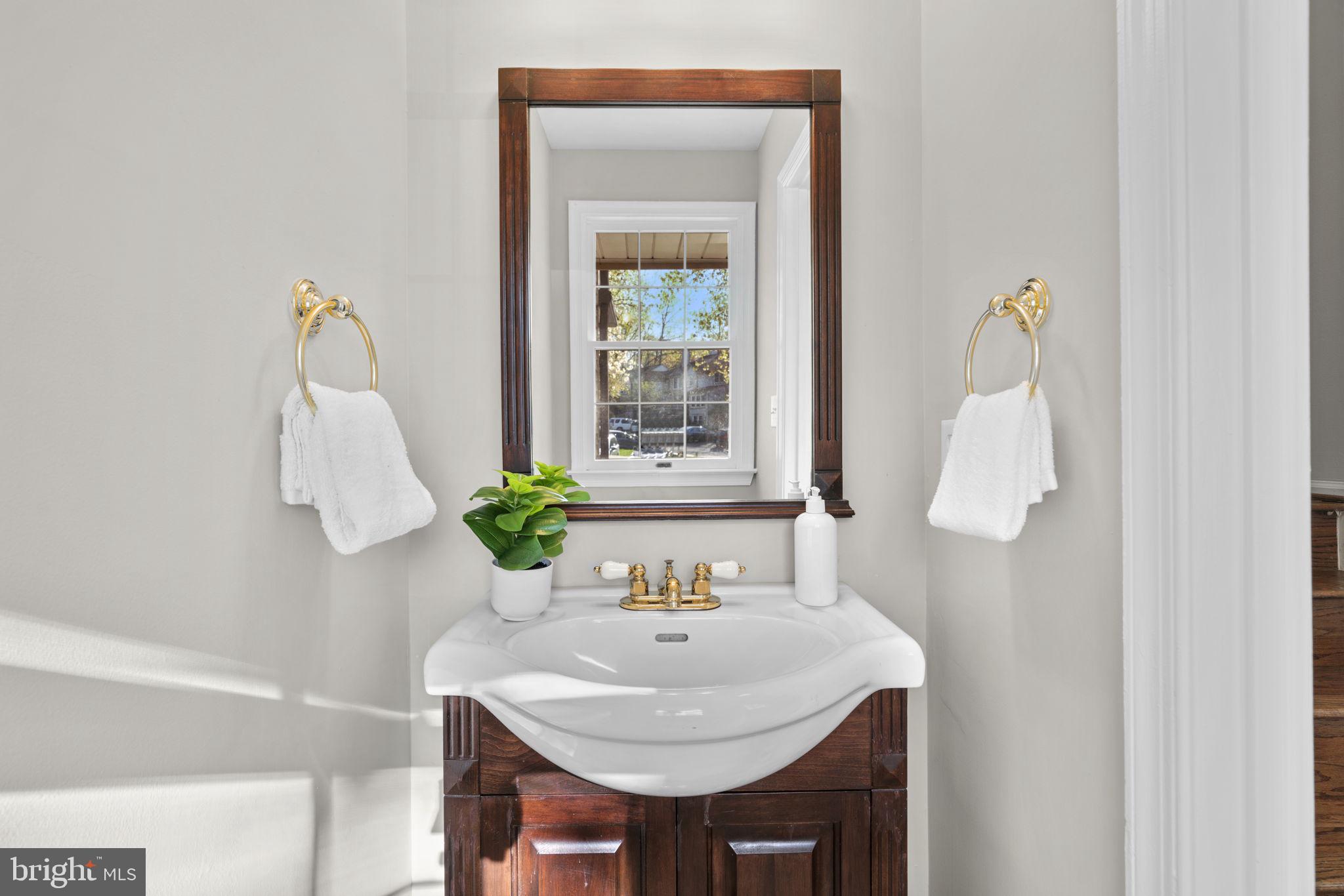 7525 Swan Point Way, Unit 195 Columbia, MD 21045 - Photo 14 of 30 a bathroom with a sink and a mirror