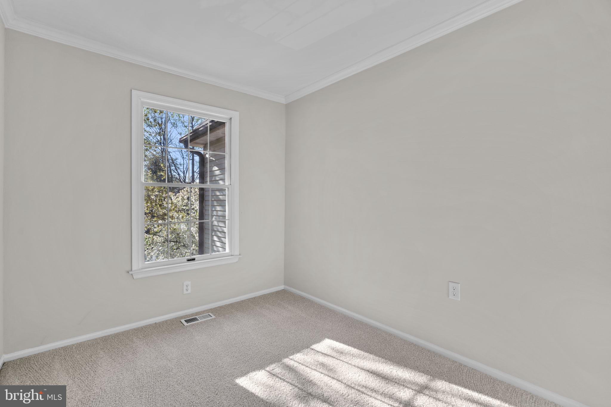7525 Swan Point Way, Unit 195 Columbia, MD 21045 - Photo 19 of 30 an empty room with windows
