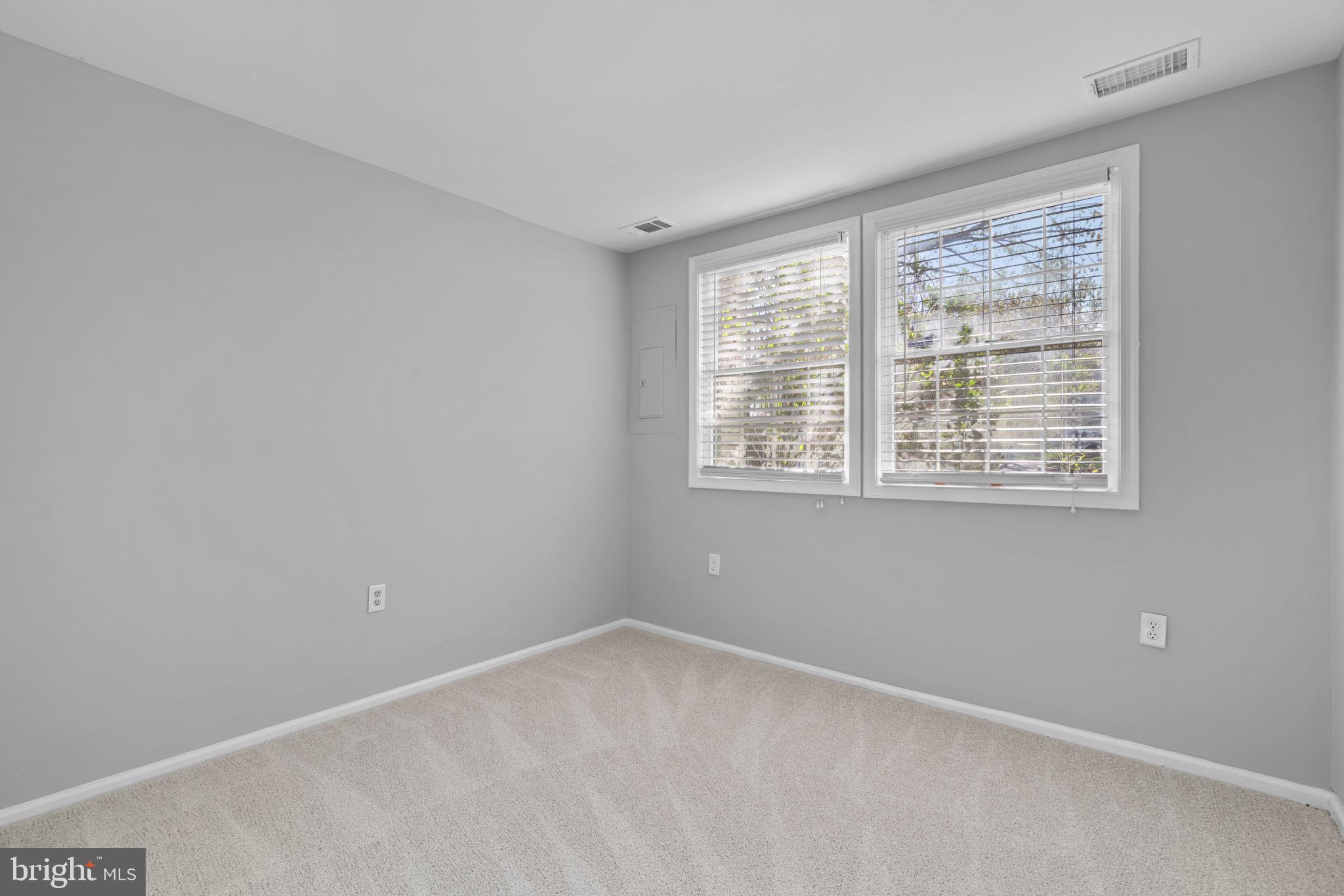 7525 Swan Point Way, Unit 195 Columbia, MD 21045 - Photo 25 of 30 a view of an empty room with a window