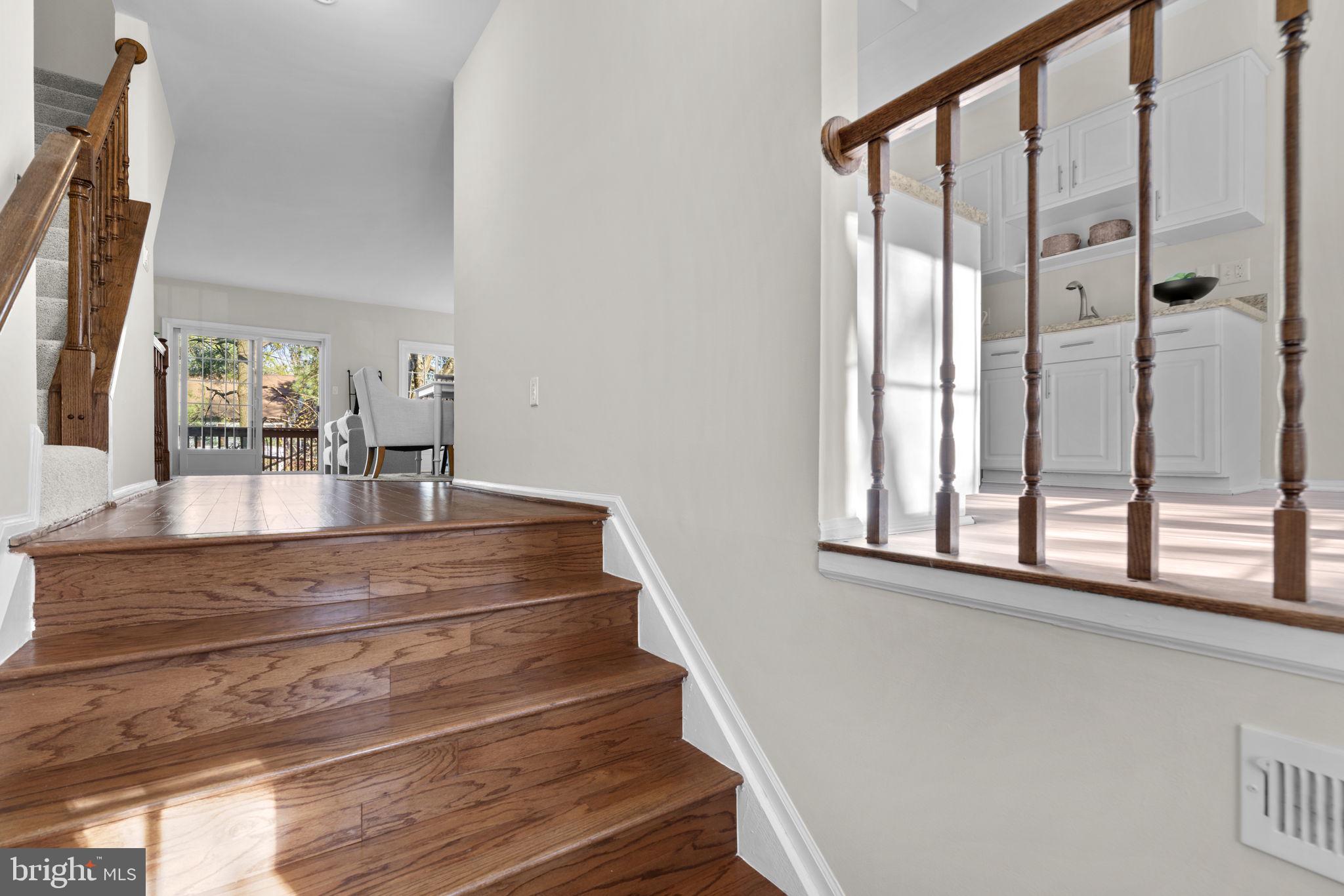 7525 Swan Point Way, Unit 195 Columbia, MD 21045 - Photo 4 of 30 a view of entryway and hall with wooden floor