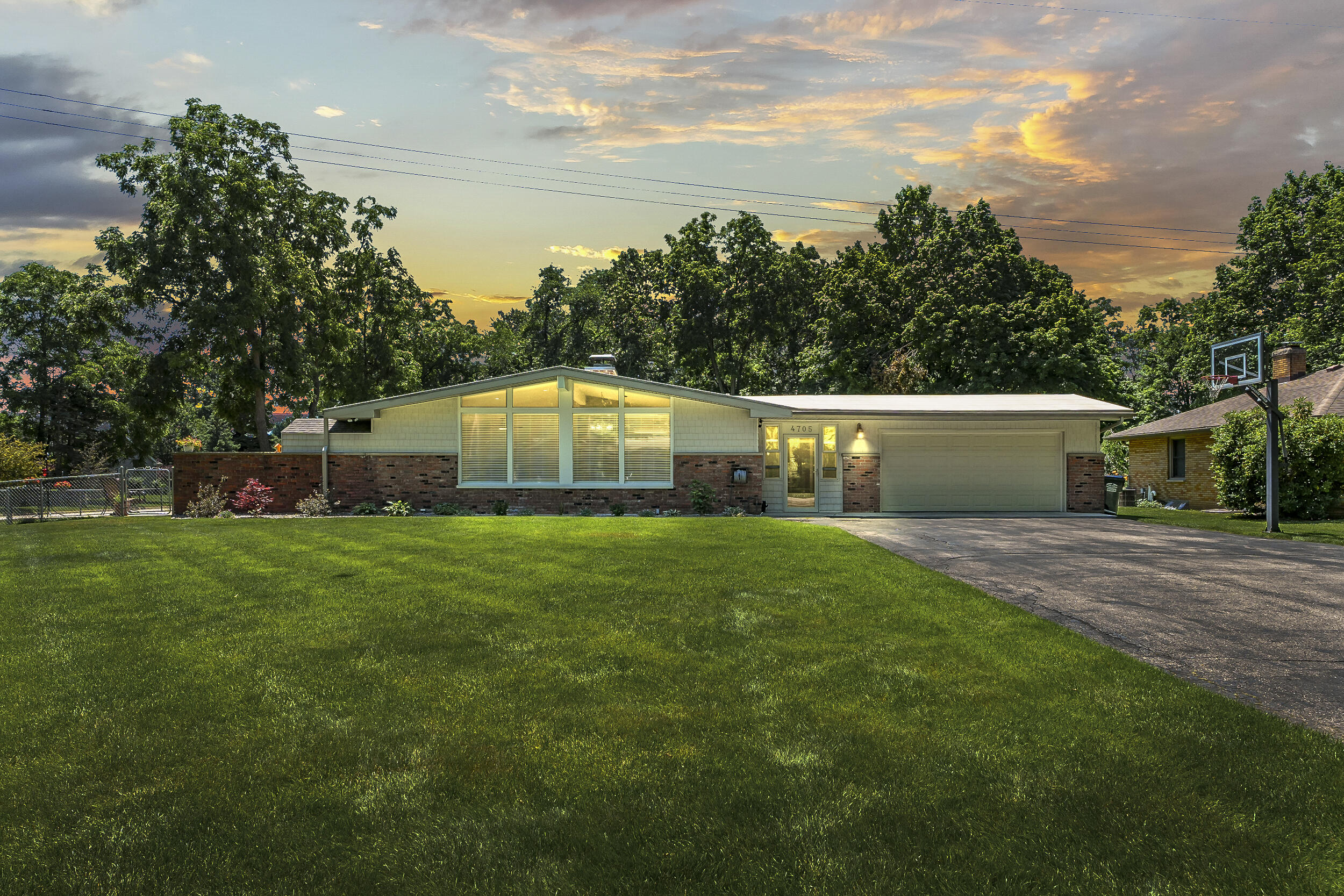 4705 Romence Road Portage, MI 49024 - Photo 1 of 74 Romence_Rd_4705-Twilight_DTE