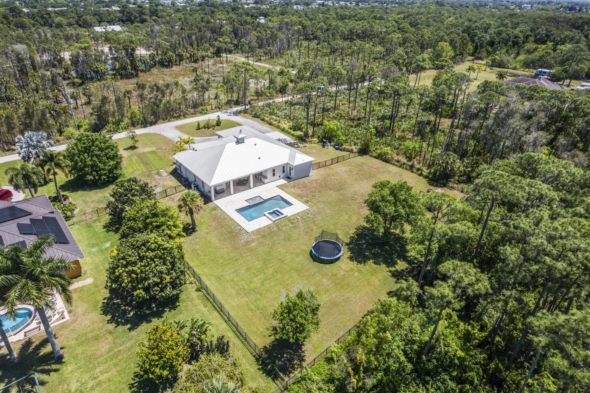2365 Dyer Road Port St. Lucie, FL 34952 - Photo 9 of 44 Aerial view of backyard