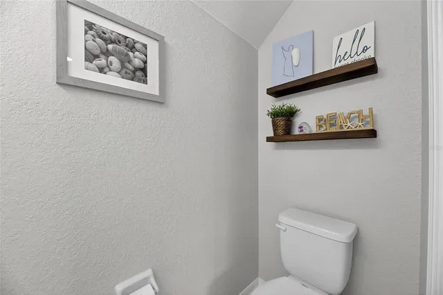 a bedroom with a bed and a closet