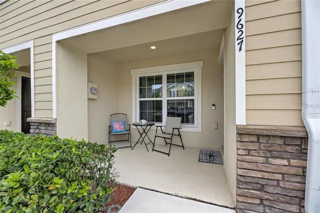 a building outdoor space with a patio and a couch